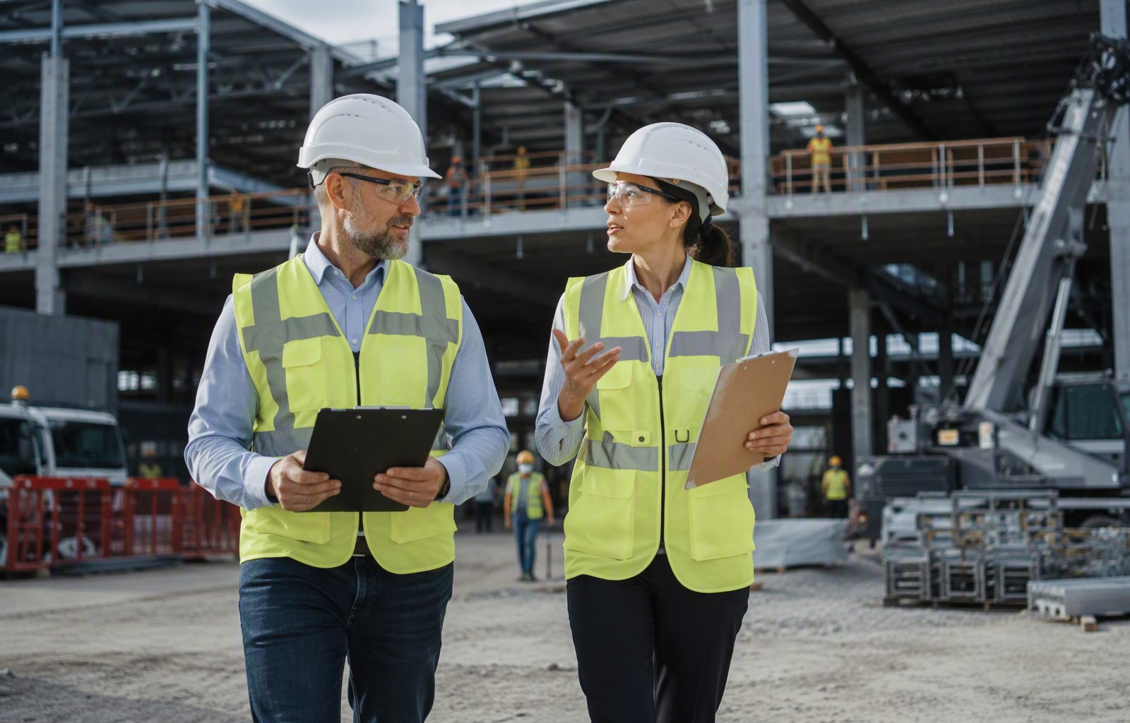 Safety coordinators walking a client construction site together